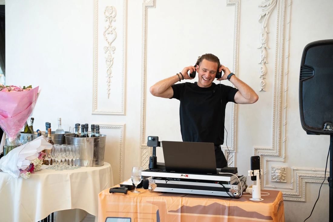 Rami enjoying a DJ set with headphones